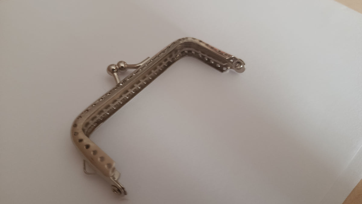 Fechos para bolsas em metal